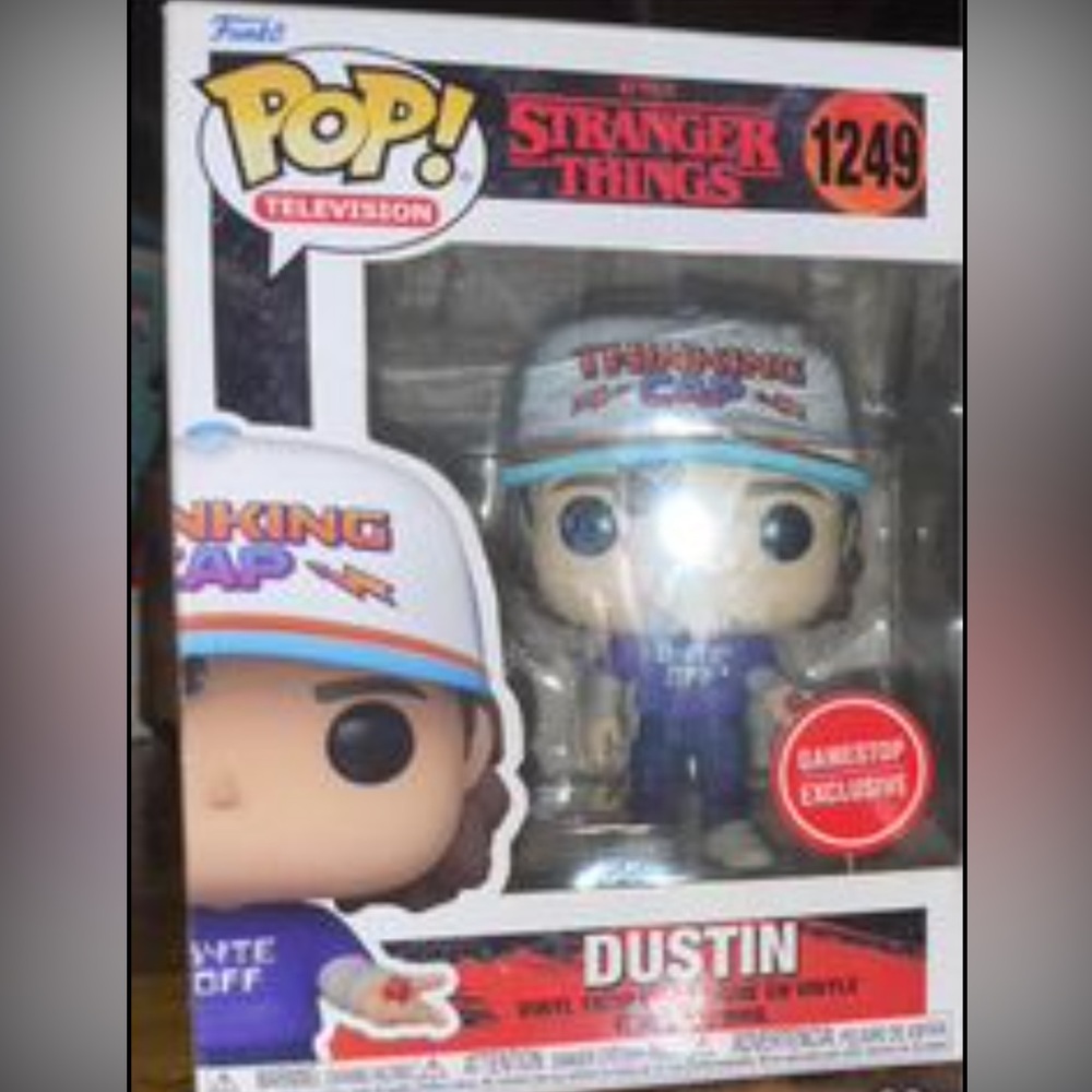 Stranger Things Dustin GameStop exclusive collectible Funko pop.